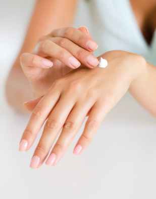applying body lotion care cosmetic product